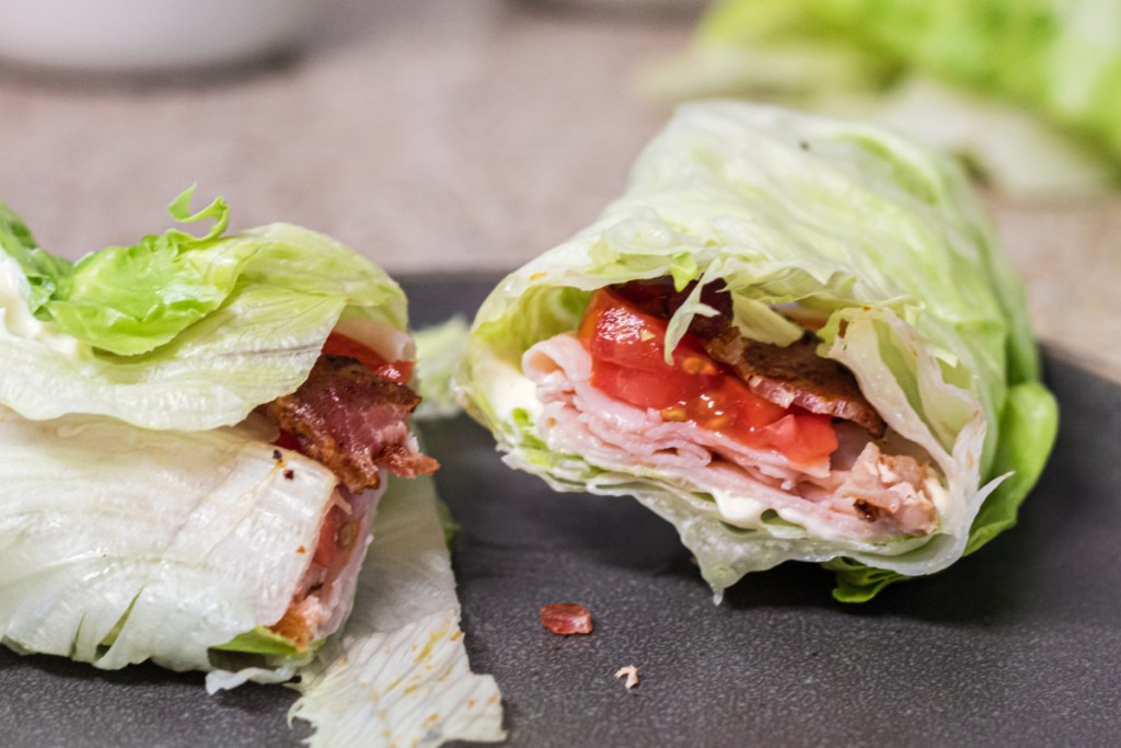 a looking inside a lettuce wrap