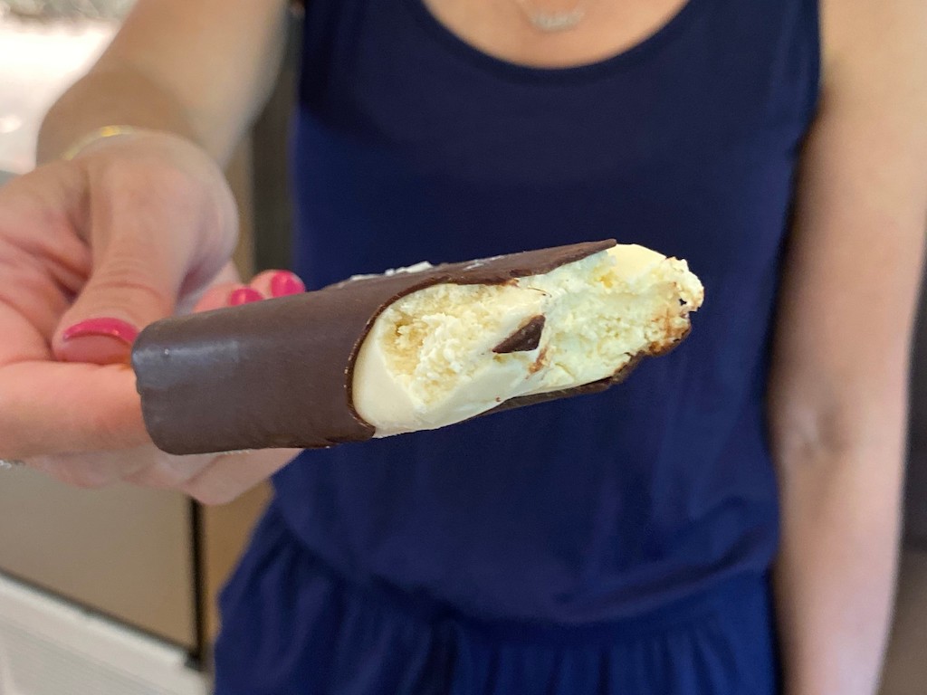 woman holding keto sea salt and caramel ice cream bar 