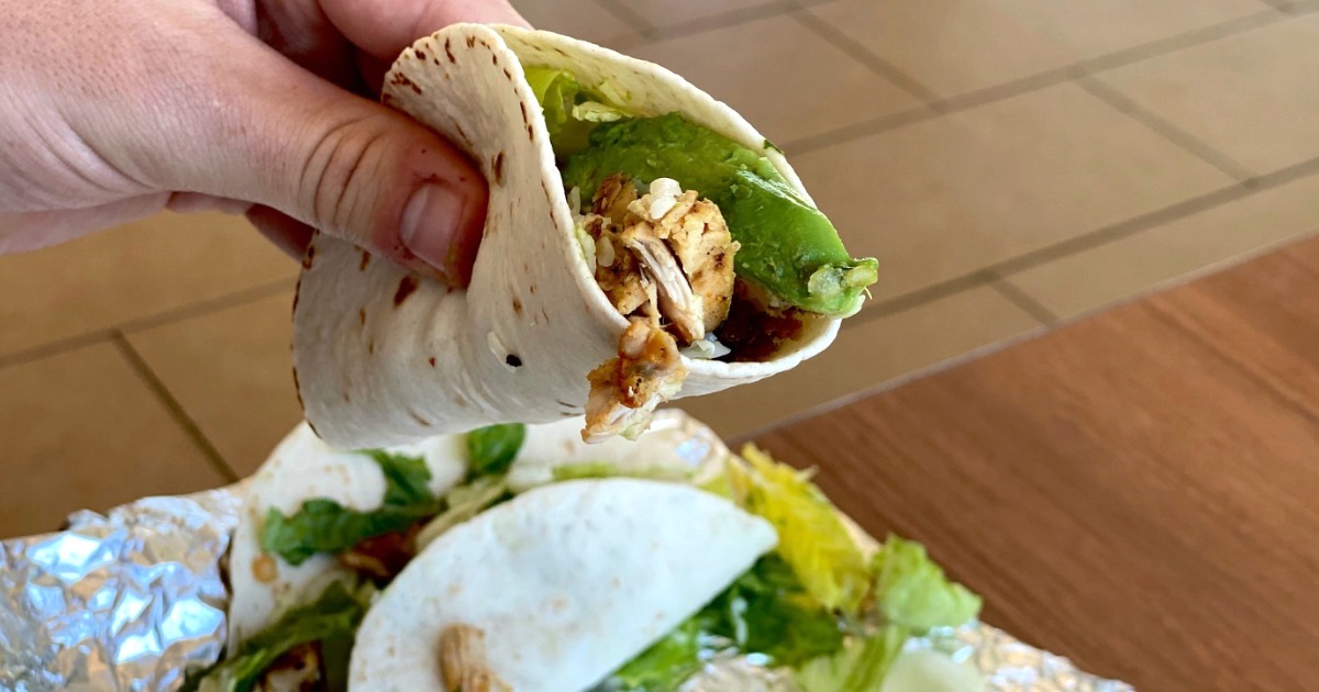 man holding keto taco