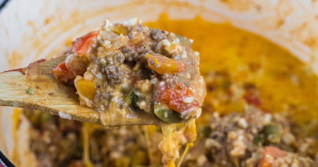 wooden spoon with stuffed bell pepper casserole