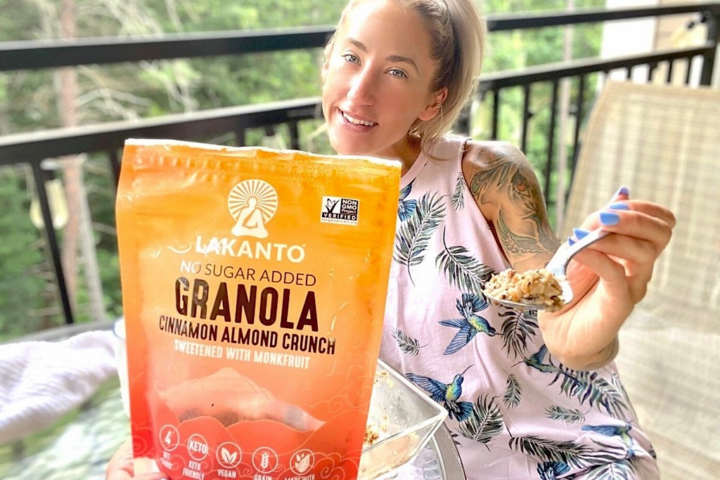 woman enjoying lakanto no sugar added keto granola 