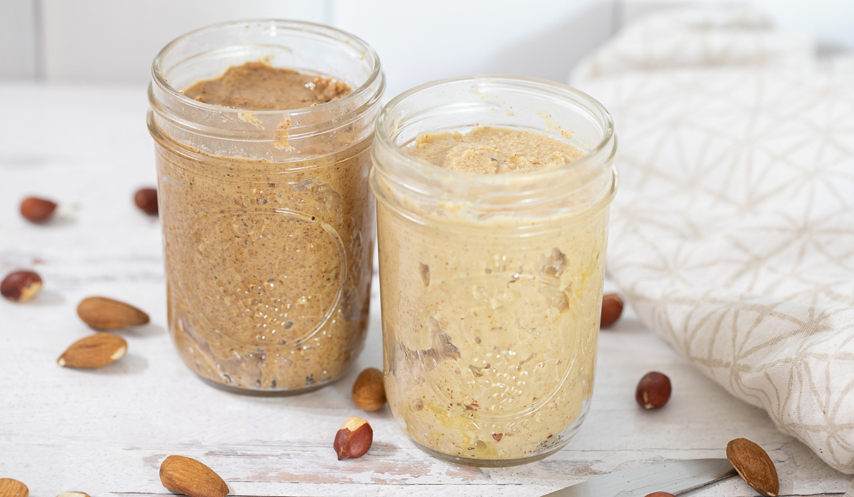 keto almond butter and peanut butter in glass jars 