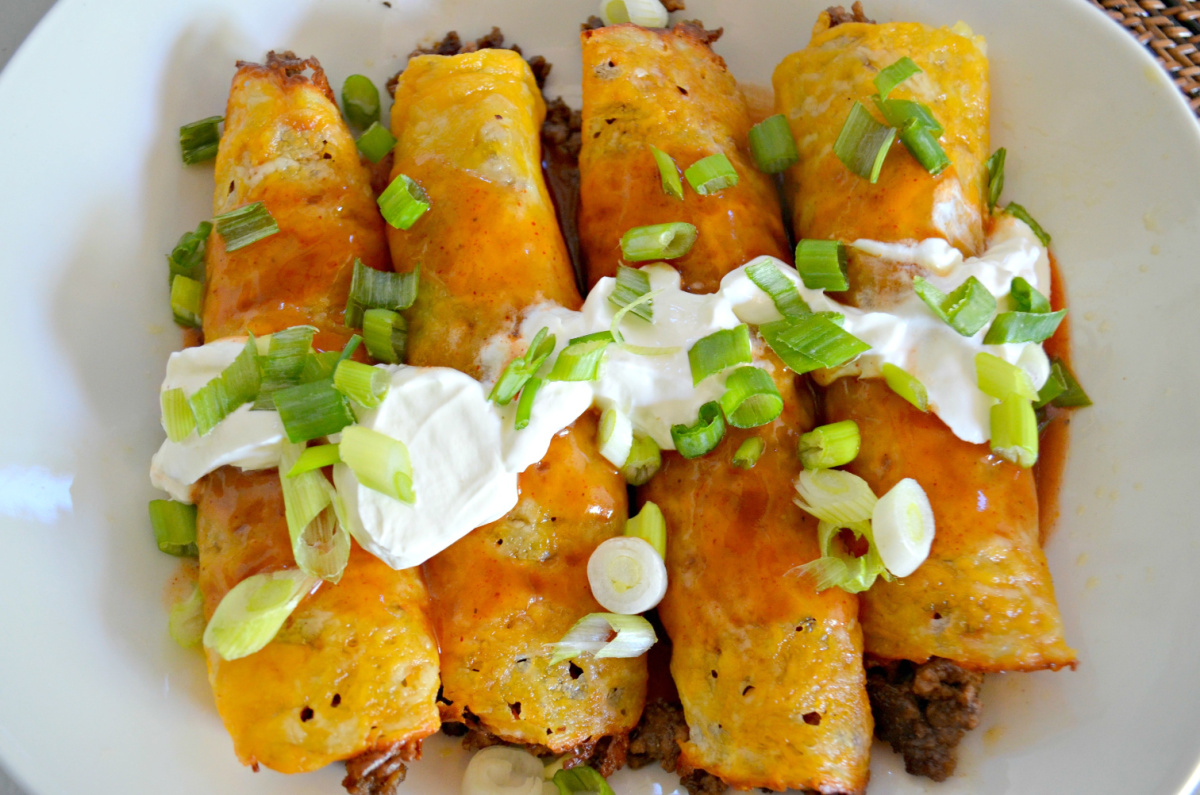 a plate of keto beef enchiladas, one of our favorite 5 ingredient meals