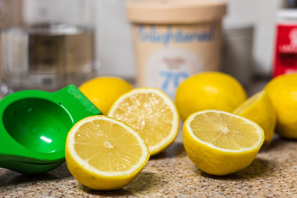 Lemons on a counter cut in half