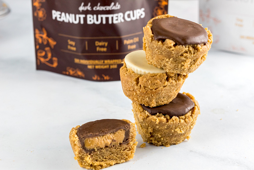 keto peanut buttter cup cookies stacked on top of each other 
