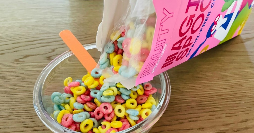 pouring cereal into a bowl