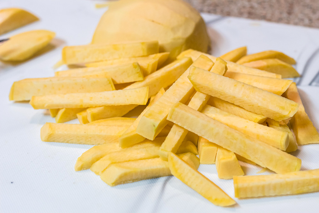 rutabaga fries sliced on cutting board