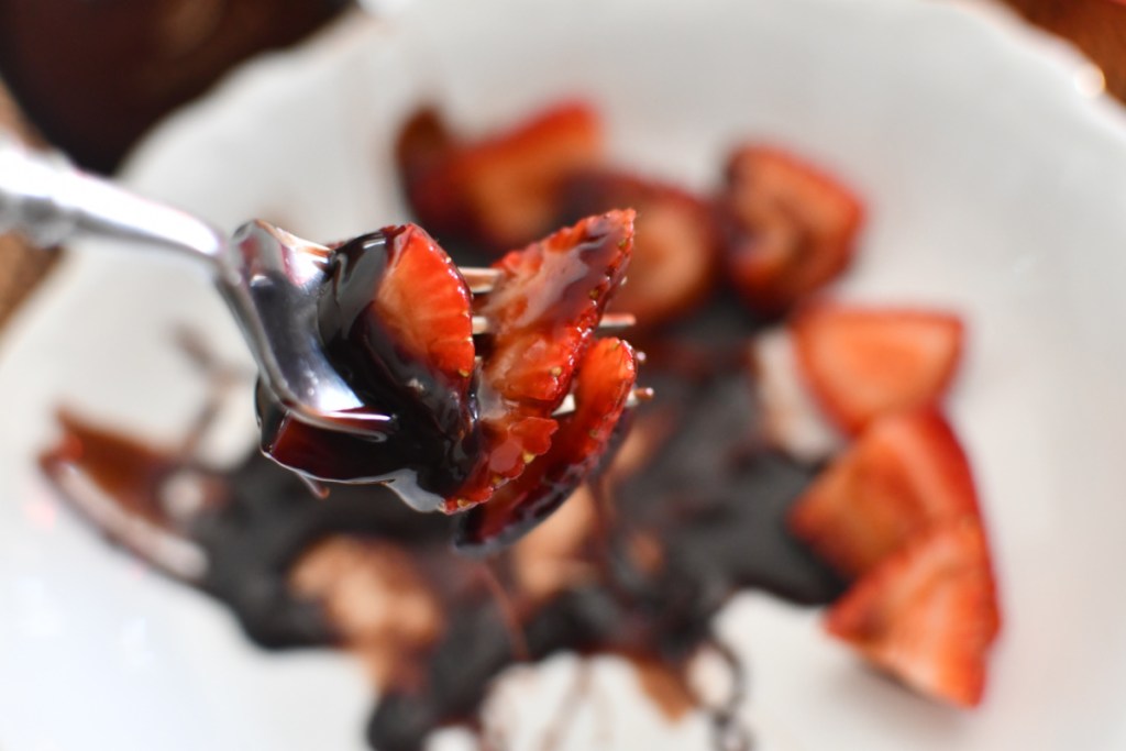 strawberries in keto chocolate syrup