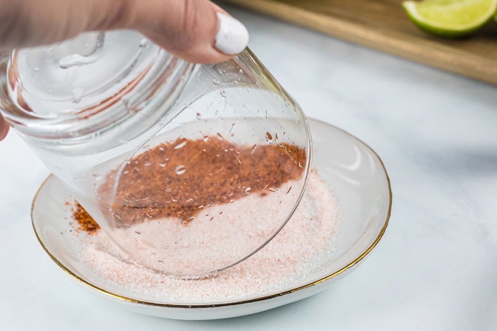 dipping glass in salt for margarita