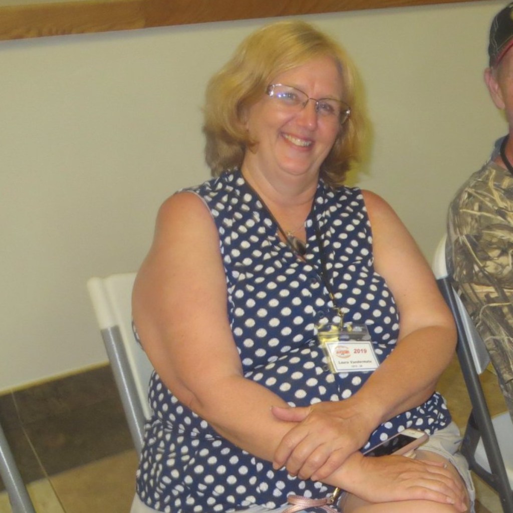 woman wearing nametag lanyard