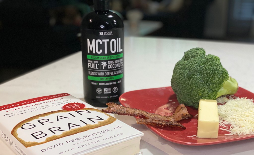 mct oil, keto foods, and the grain brain book on counter