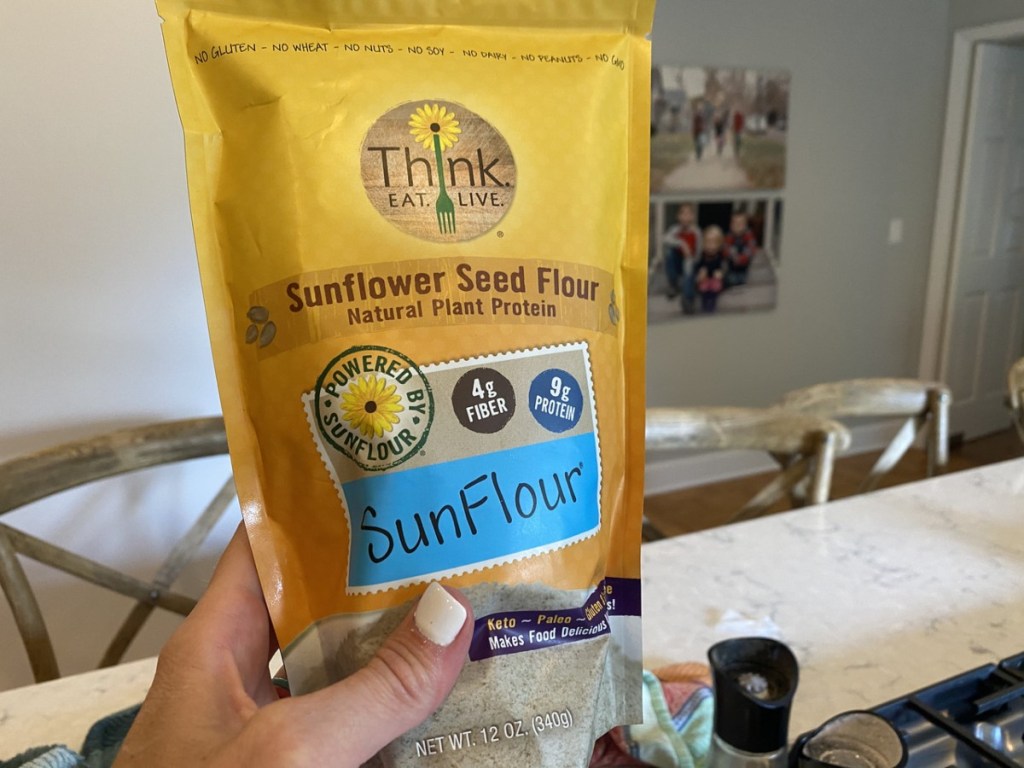 hand holding bag of SunFlour