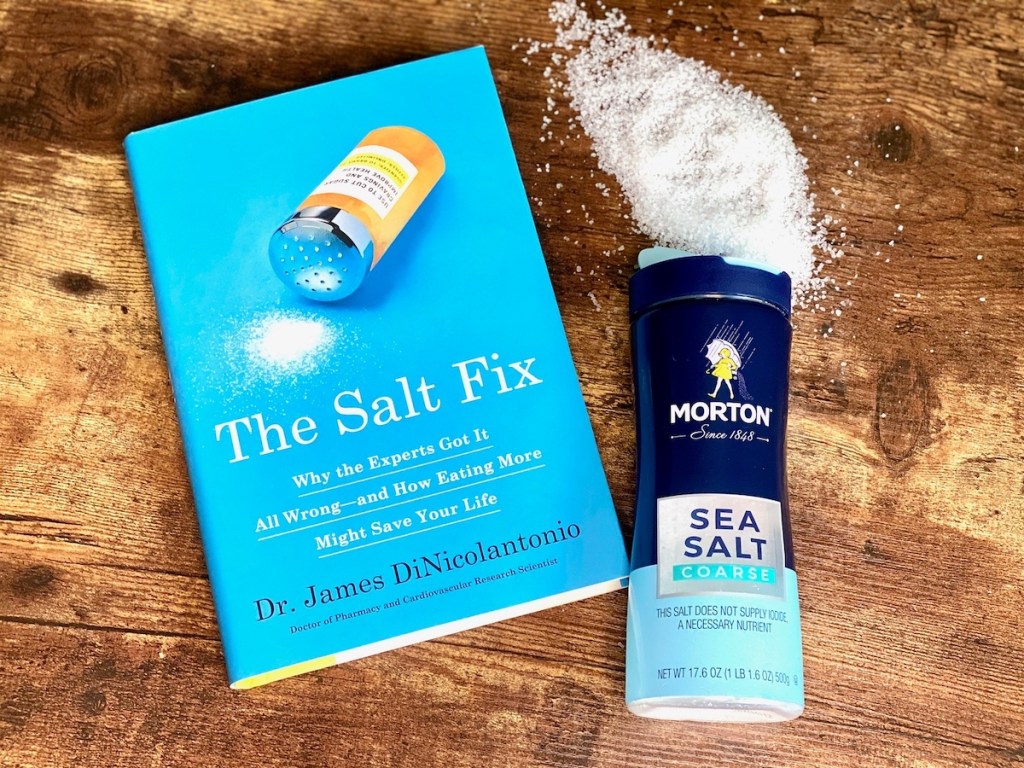 the salt fix book on table with bottle of sea salt