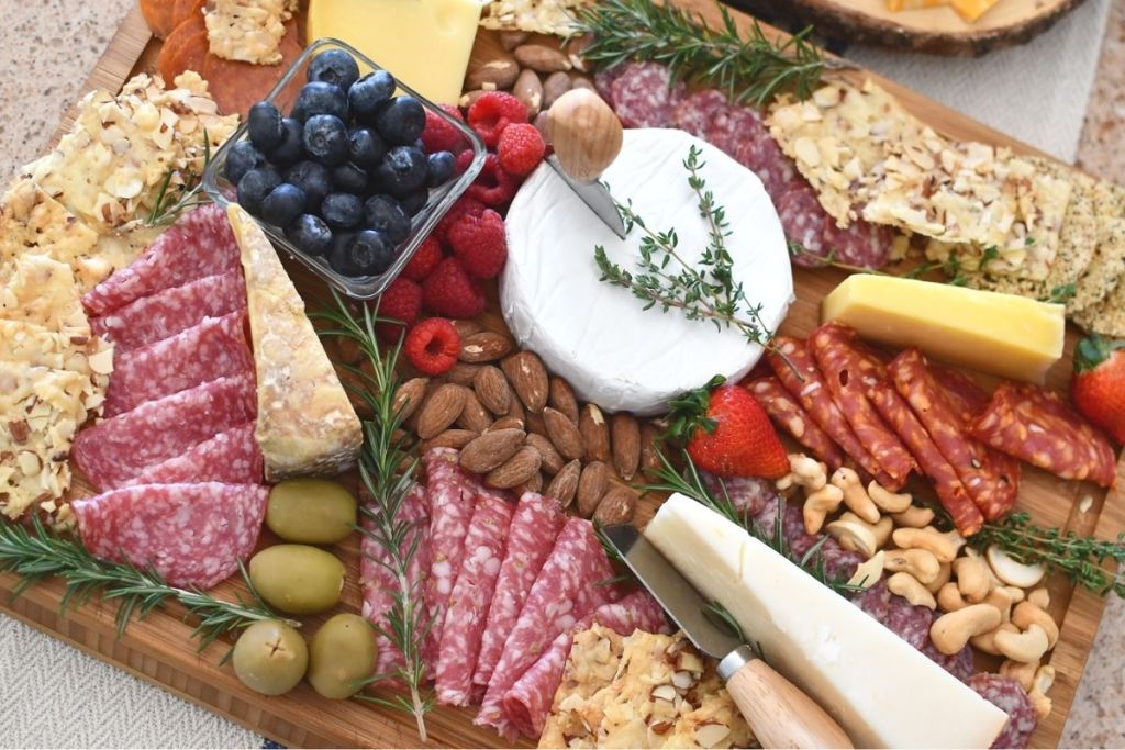 A charcuterie board with food on it