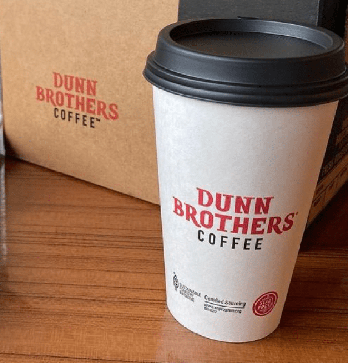 A cup of coffee from dunn brothers, one of the restaurants that has keto birthday freebies