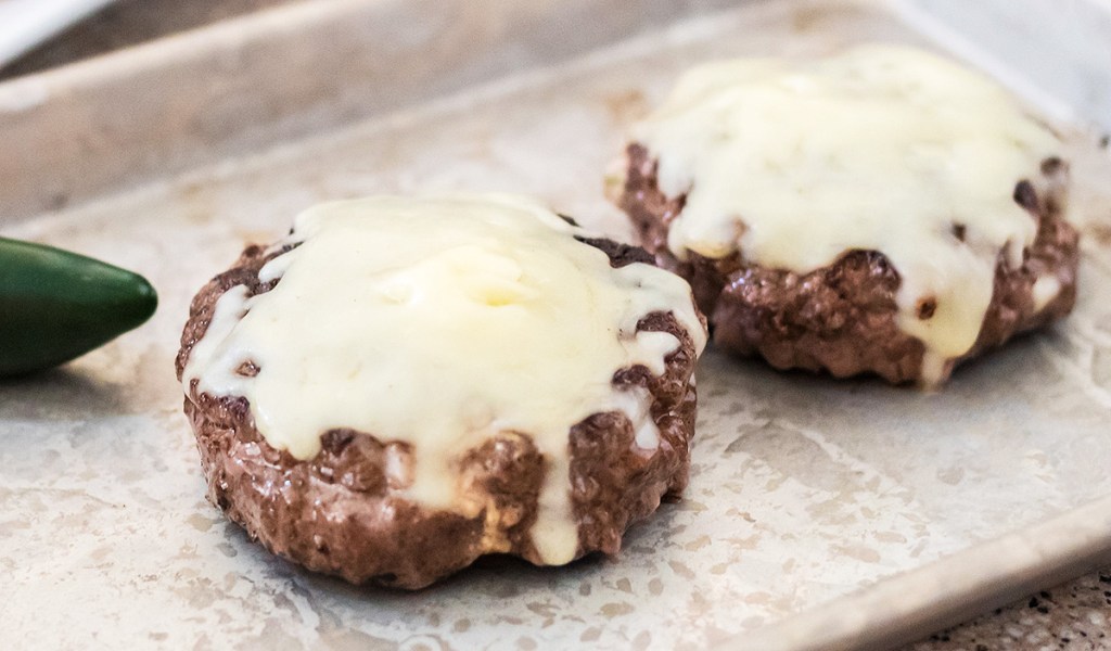 Stuffed burgers in a pan