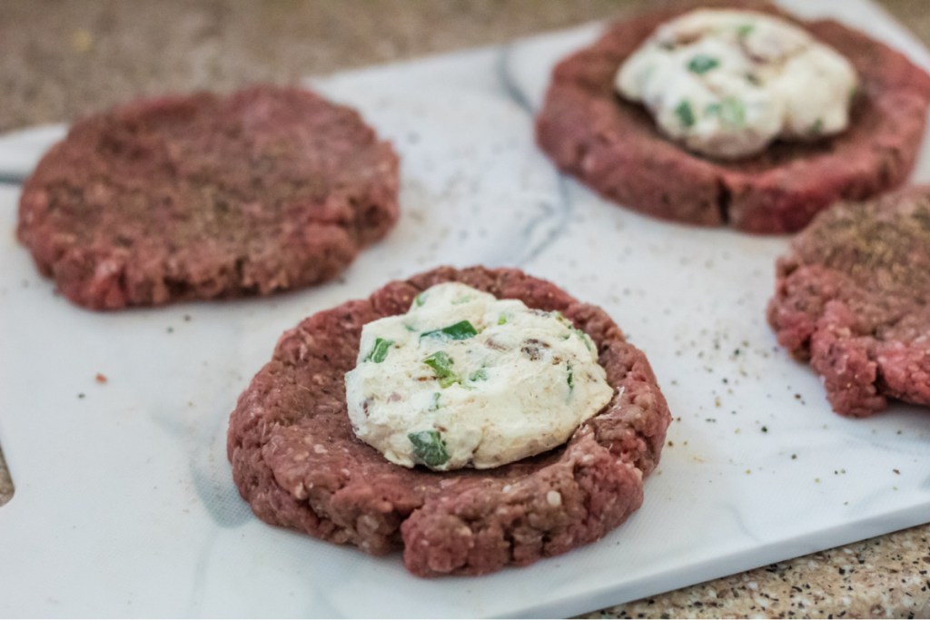 hamburger patty with cream cheese disk