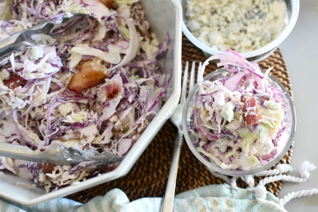 dishing up a bowl of blue cheese coleslaw