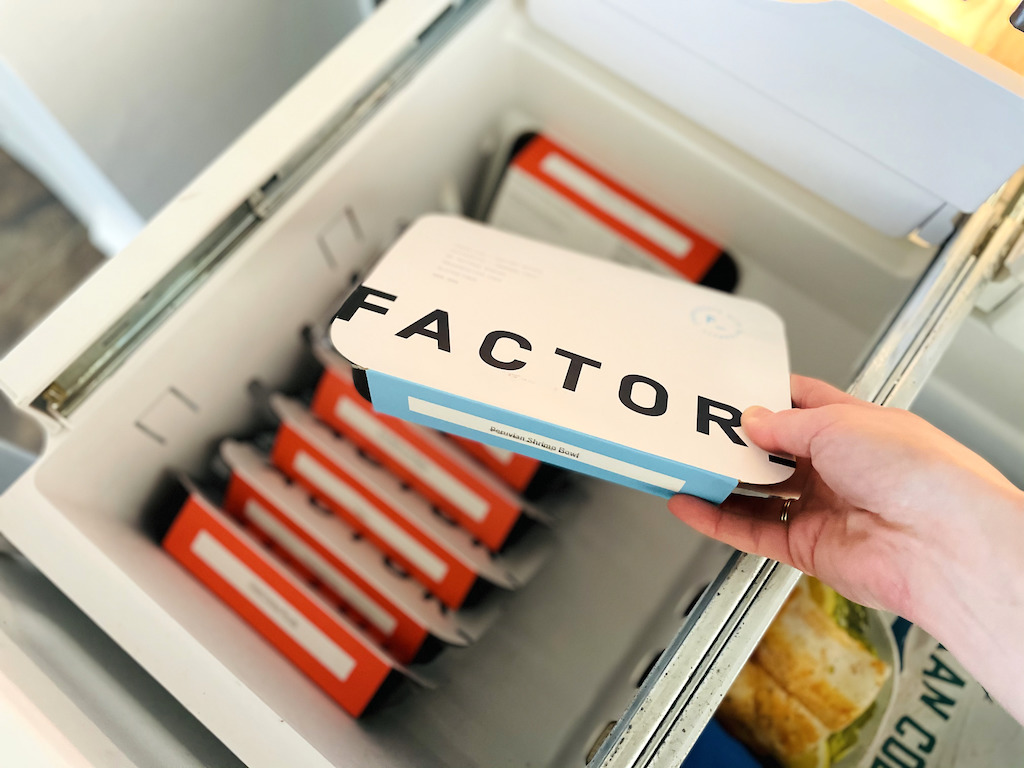 pulling Factor frozen meal out of freezer