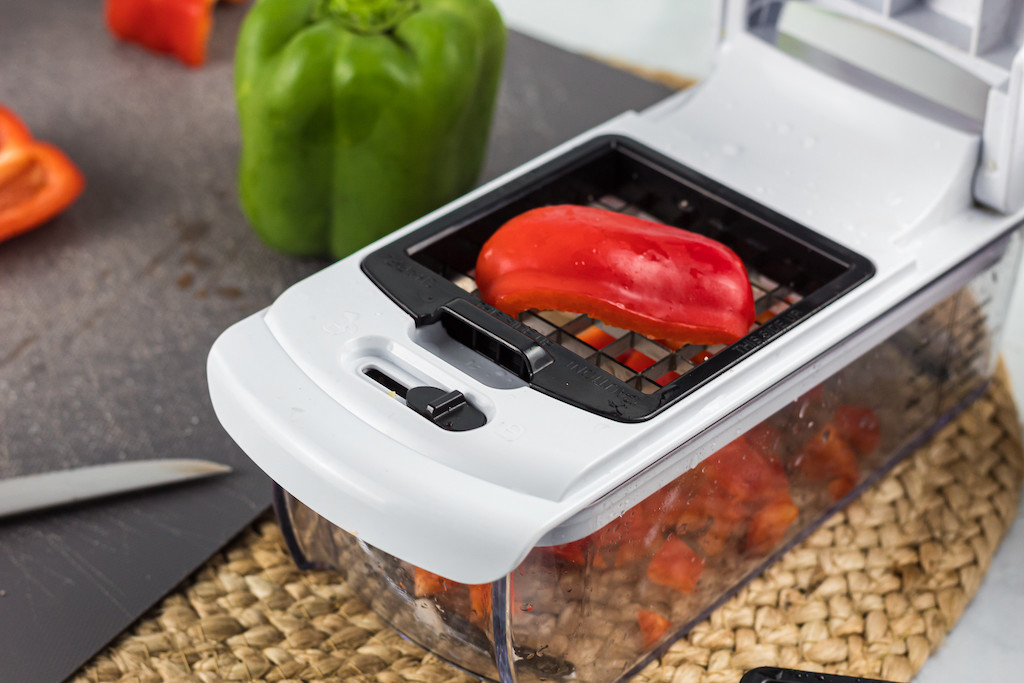 veggie chopper slicing red bell pepper 