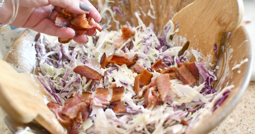 putting bacon on blue cheese coleslaw