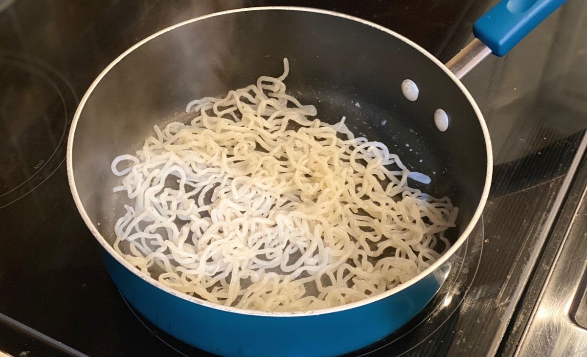 Noodles in a skillet on the stove