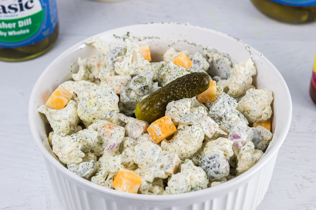 keto dill pickle cauliflower salad in casserole dish 