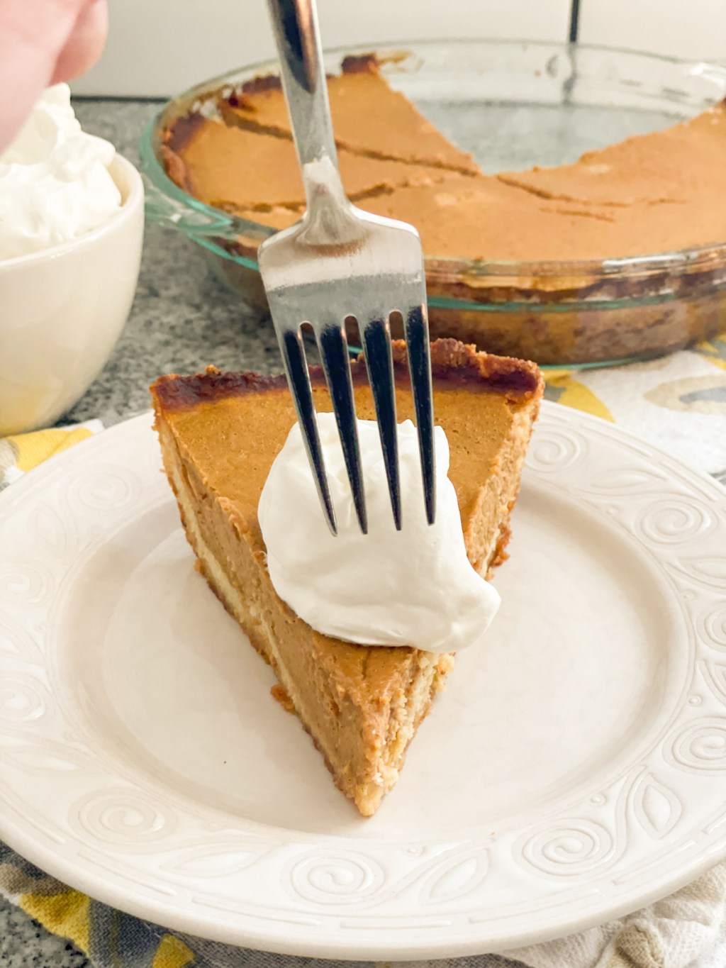 taking a bite of keto pumpkin pie