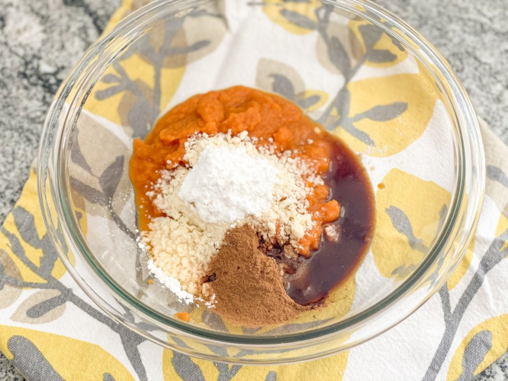 mixing bowl with pumpkin pie filling ingredients