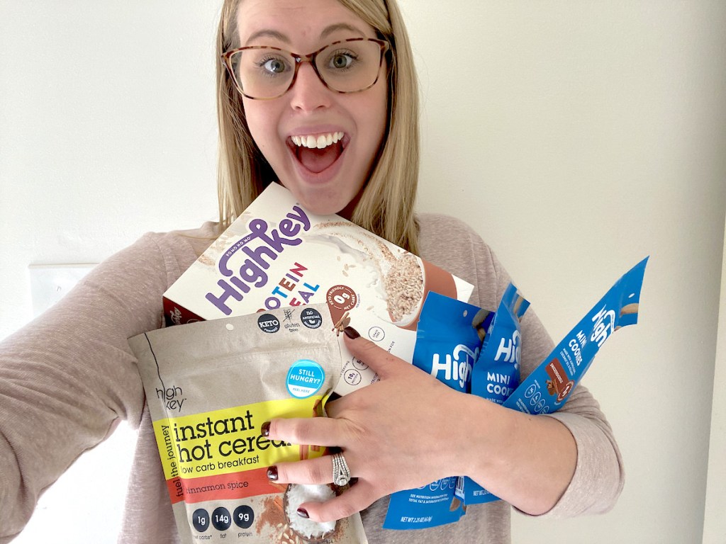 woman holding various types of high key cereal