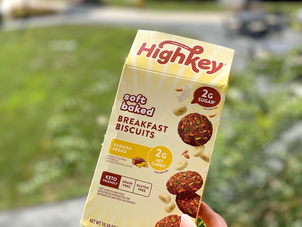 holding HighKey keto breakfast biscuits 