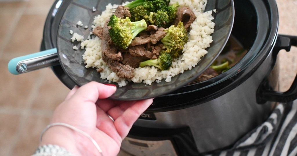 bowl of Crockpot beef and broccoli with cauliflower rice 