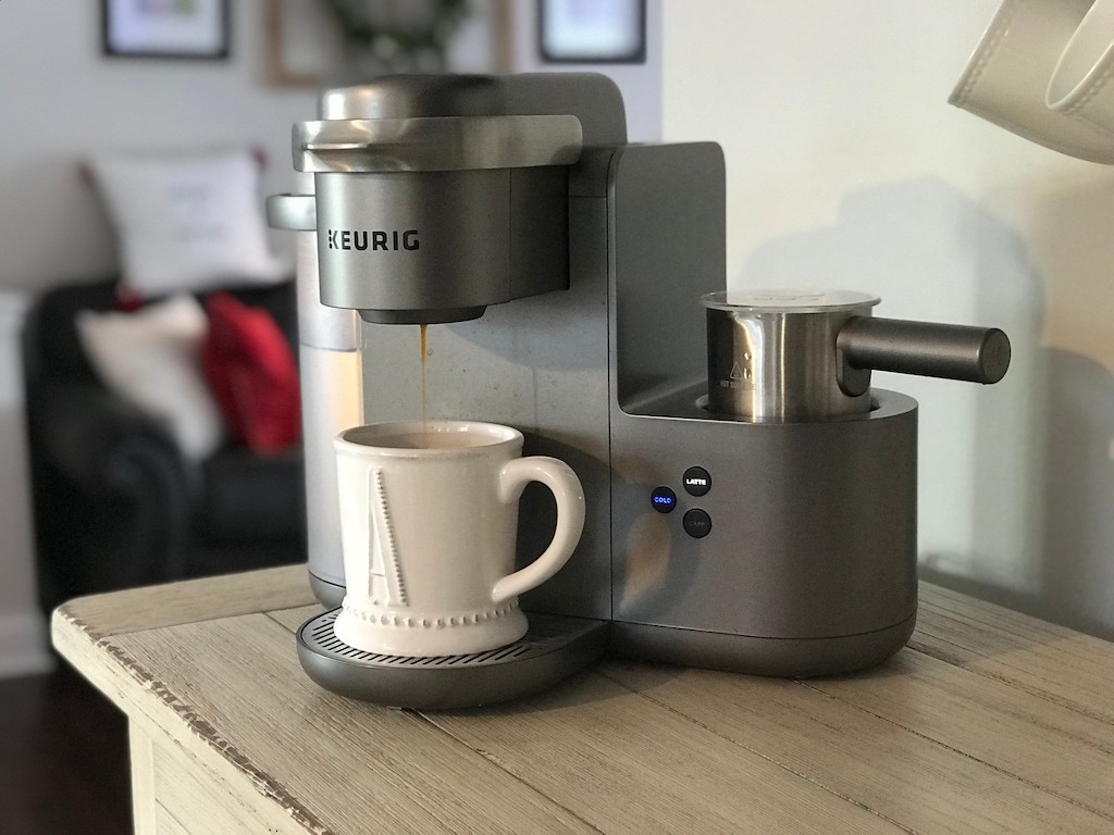 Keurig machine putting coffee in mug 