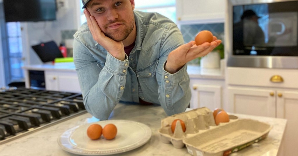 man holding egg