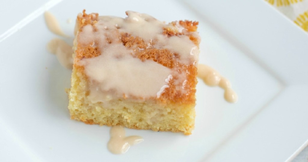 pineapple cake slice with cherry glaze on plate