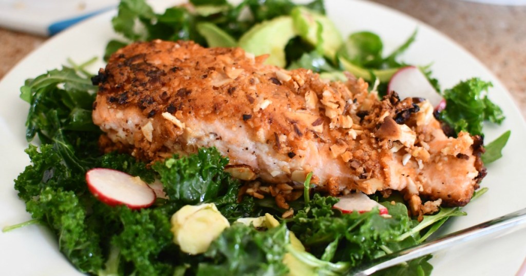 almond crusted salmon on bed of lettuce 