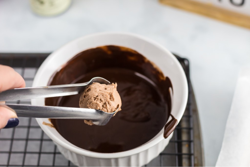 dipping fat bombs in chocolate