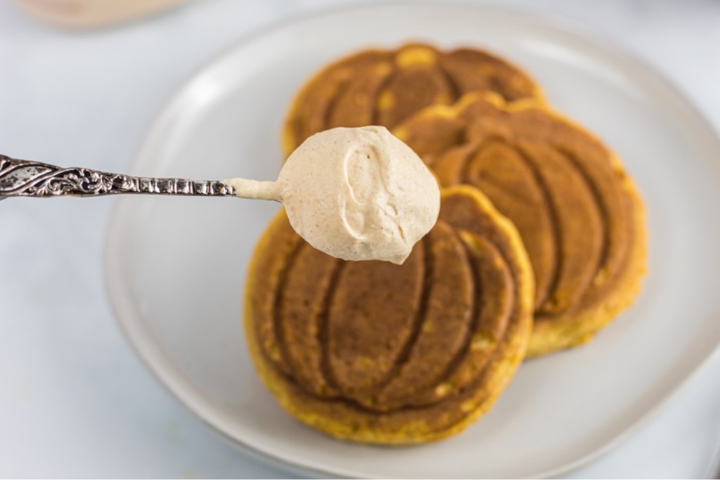 dollop of whipped cream on pumpkin chaffle