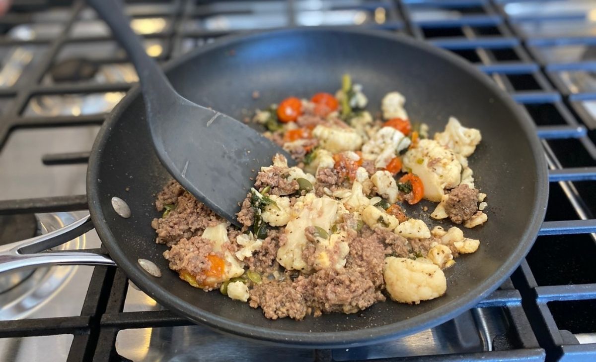 Meat and veggies in a skillet