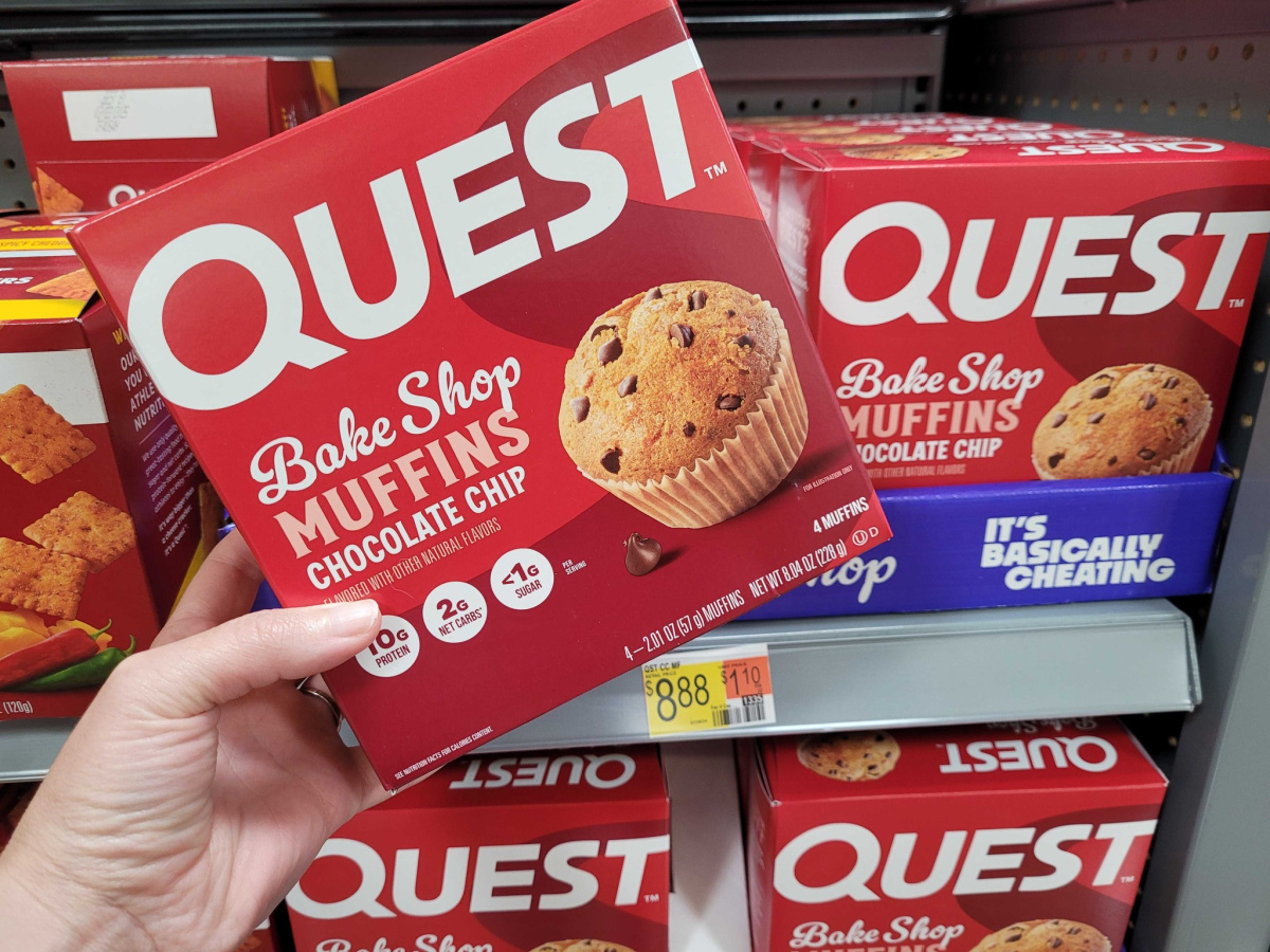 hand holding a package of keto friendly Quest Bake Shop Muffins