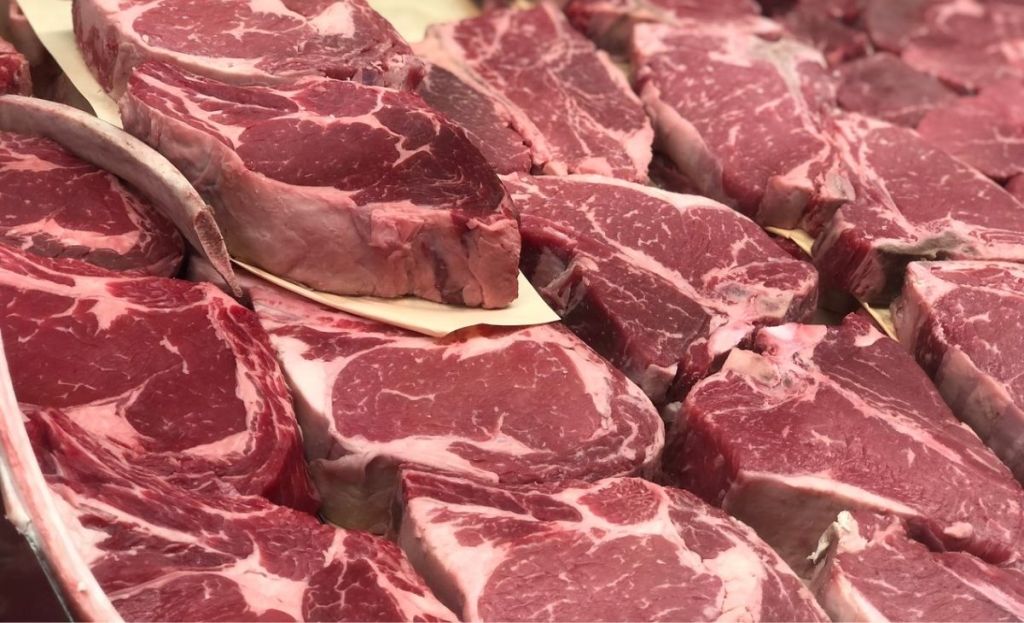 Raw steaks at a grocery store