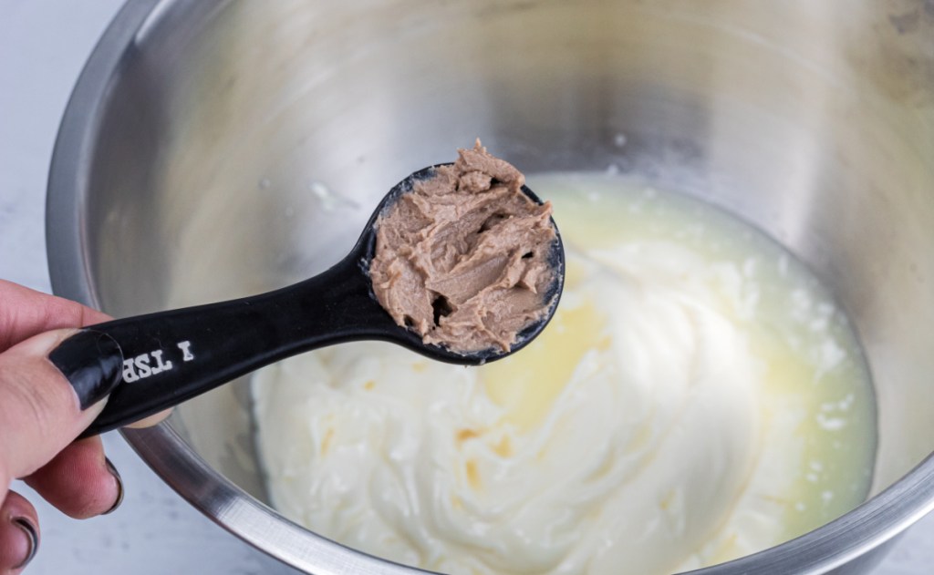 adding anchovy paste in mixing bowl
