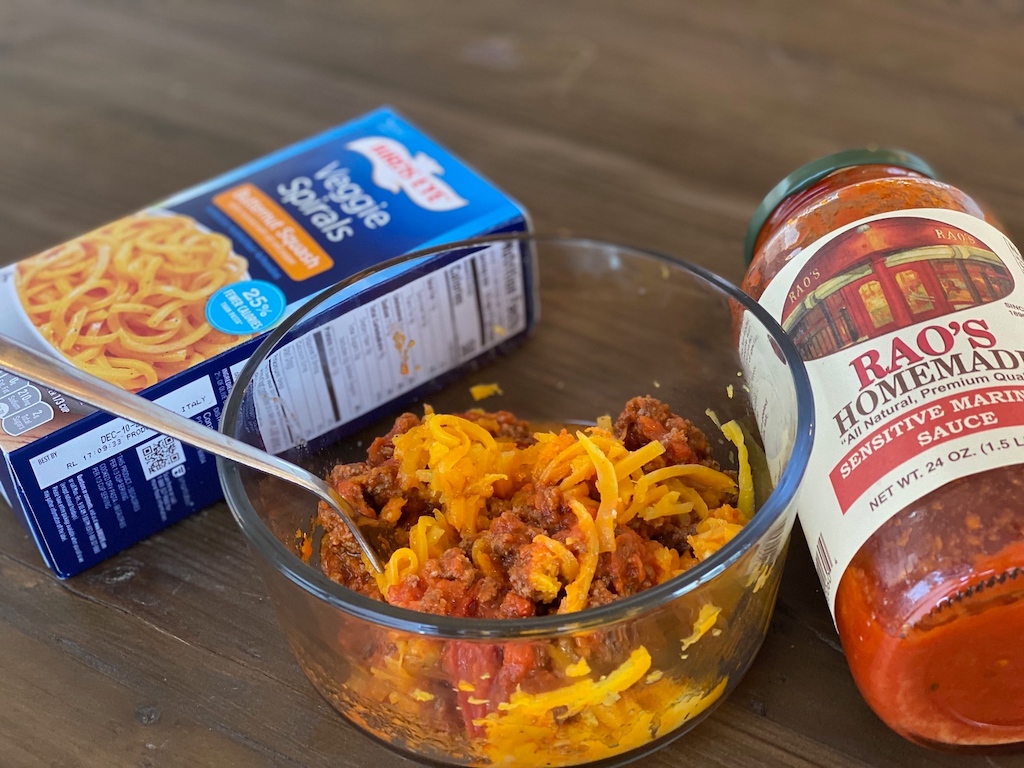 butternut squash noodles in bowl with meat sauce 