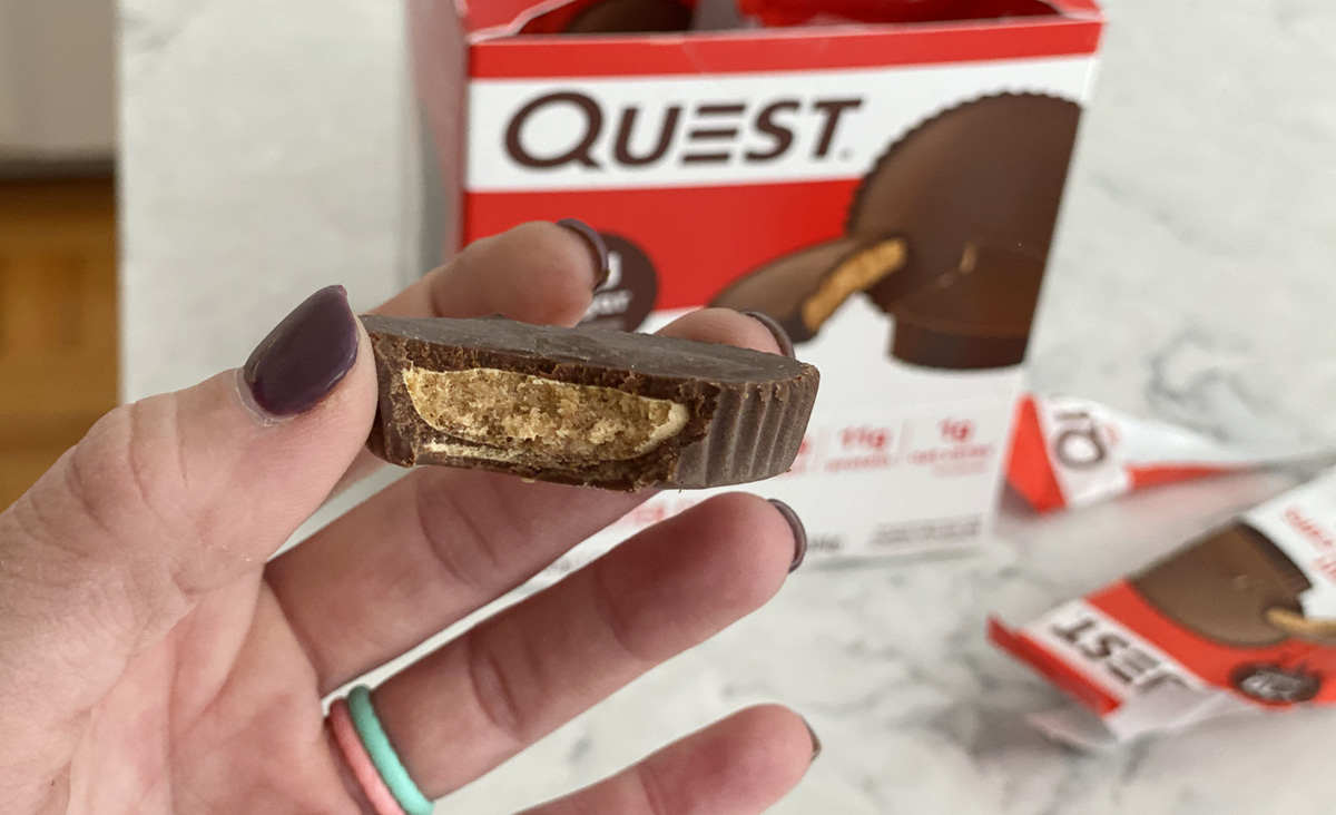 woman holding quest peanut butter cups