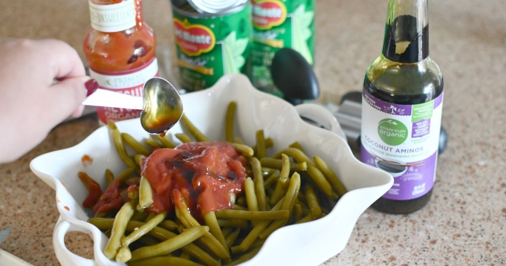 adding primal ketchup and coconut aminos to green beans