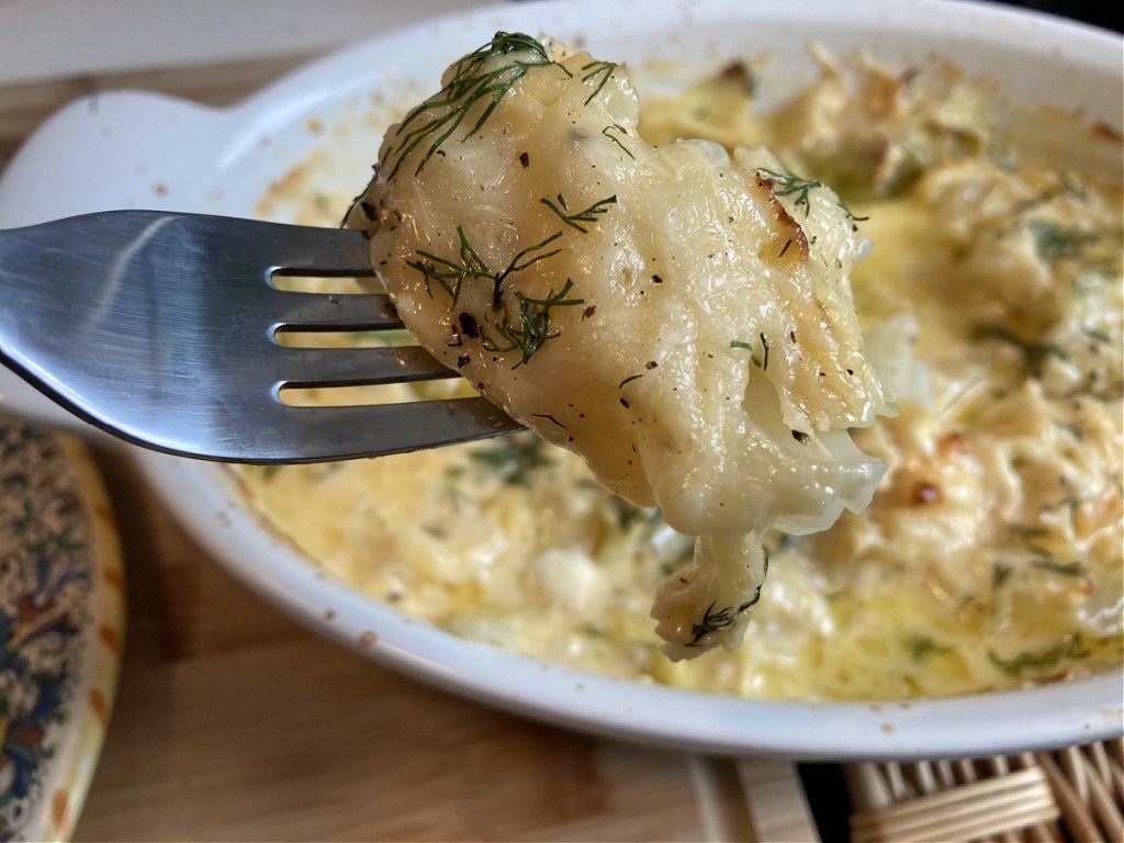 keto scalloped cabbage on fork