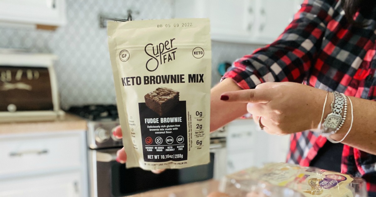 holding a package of Super Fat Brownie Mix