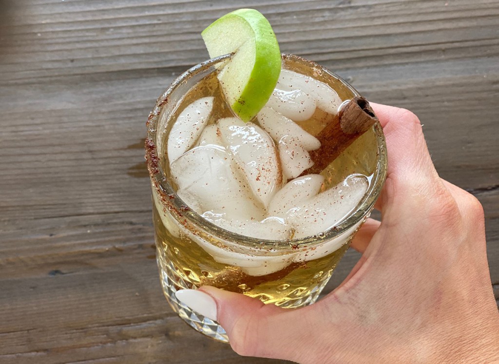 hand holding keto caramel cocktail