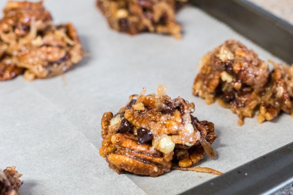 pecan clusters on baking sheet