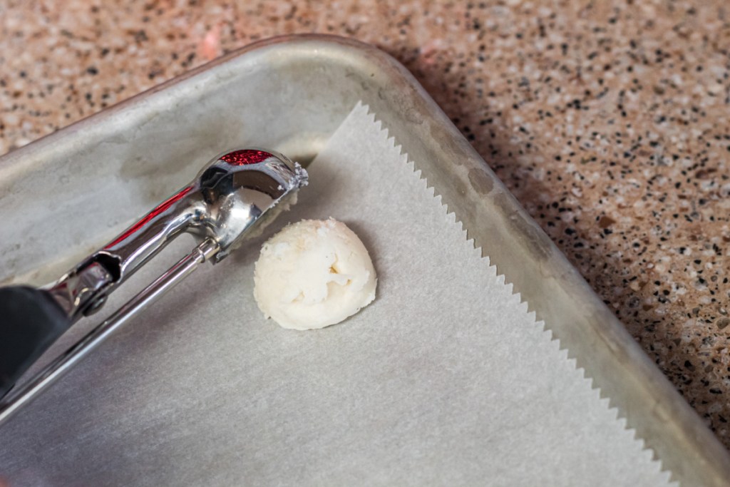 keto peppermint filling scooping out on baking sheet